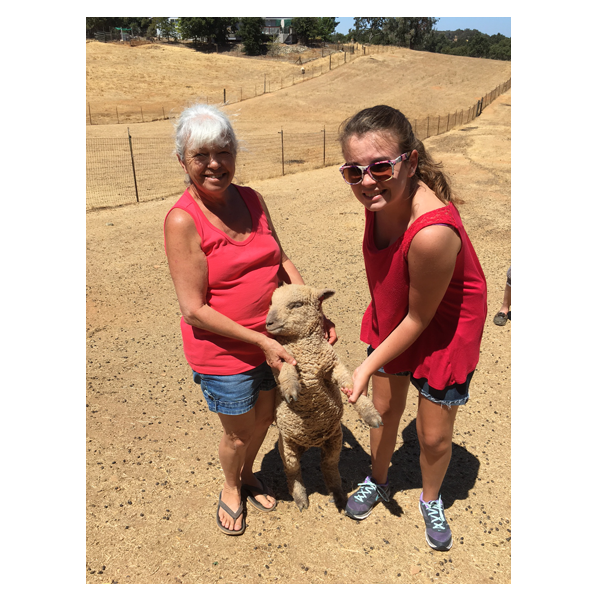 picture of 2 women with lamb